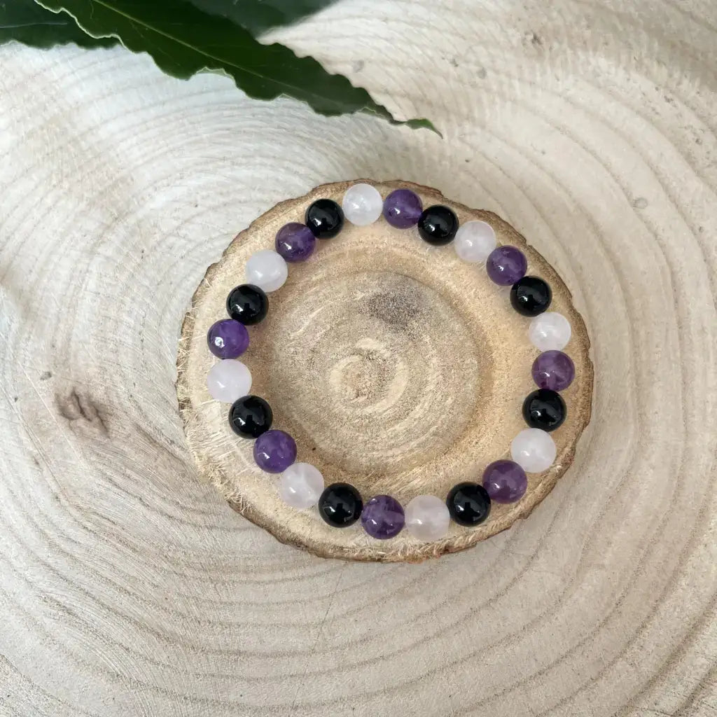 Bracelet Accompagnant du Deuil en pierres semi-précieuses, améthyste et quartz avec un design apaisant