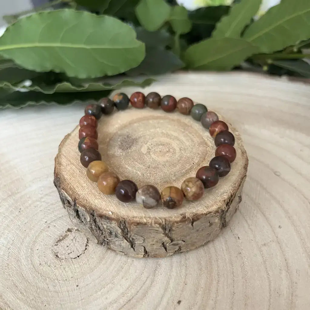 Bracelet Jaspe Picasso en pierres naturelles multicolores monté sur un support en bois