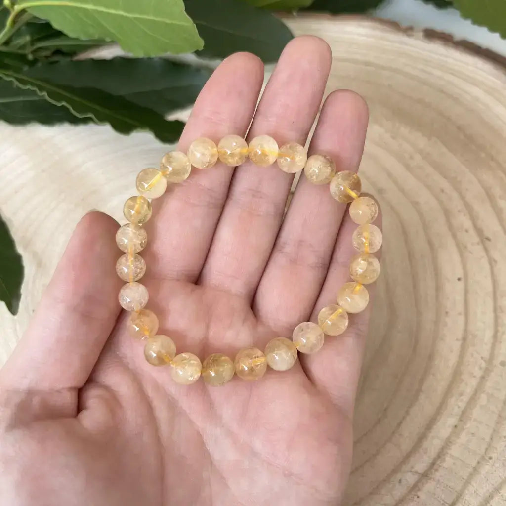 Bracelet Perle Citrine en perles dorées, idéal pour apporter une touche lumineuse à votre poignet